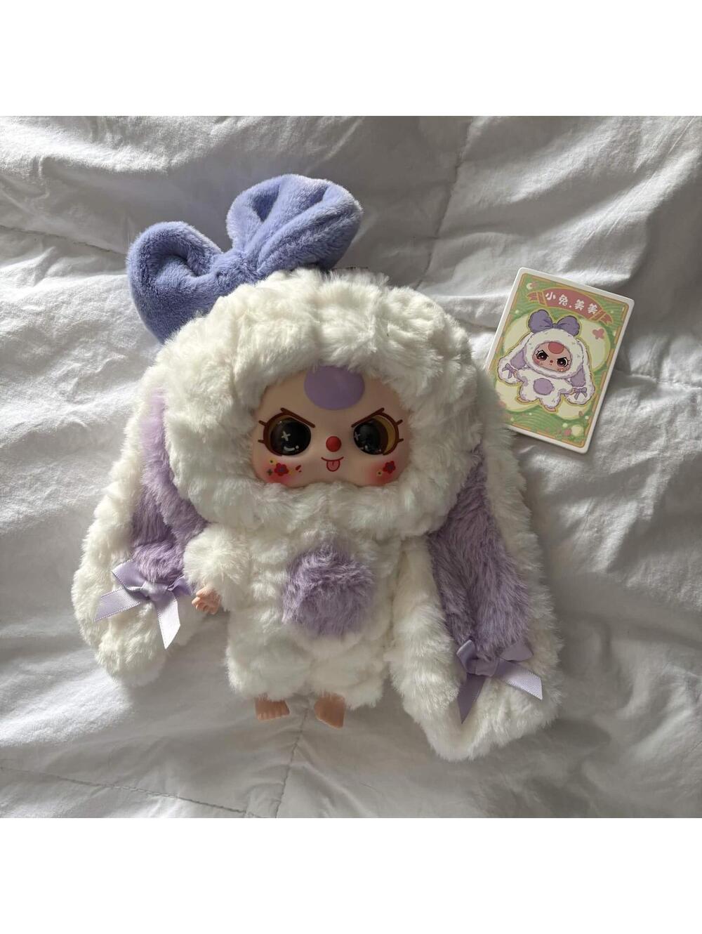 white and purple bunny keychain